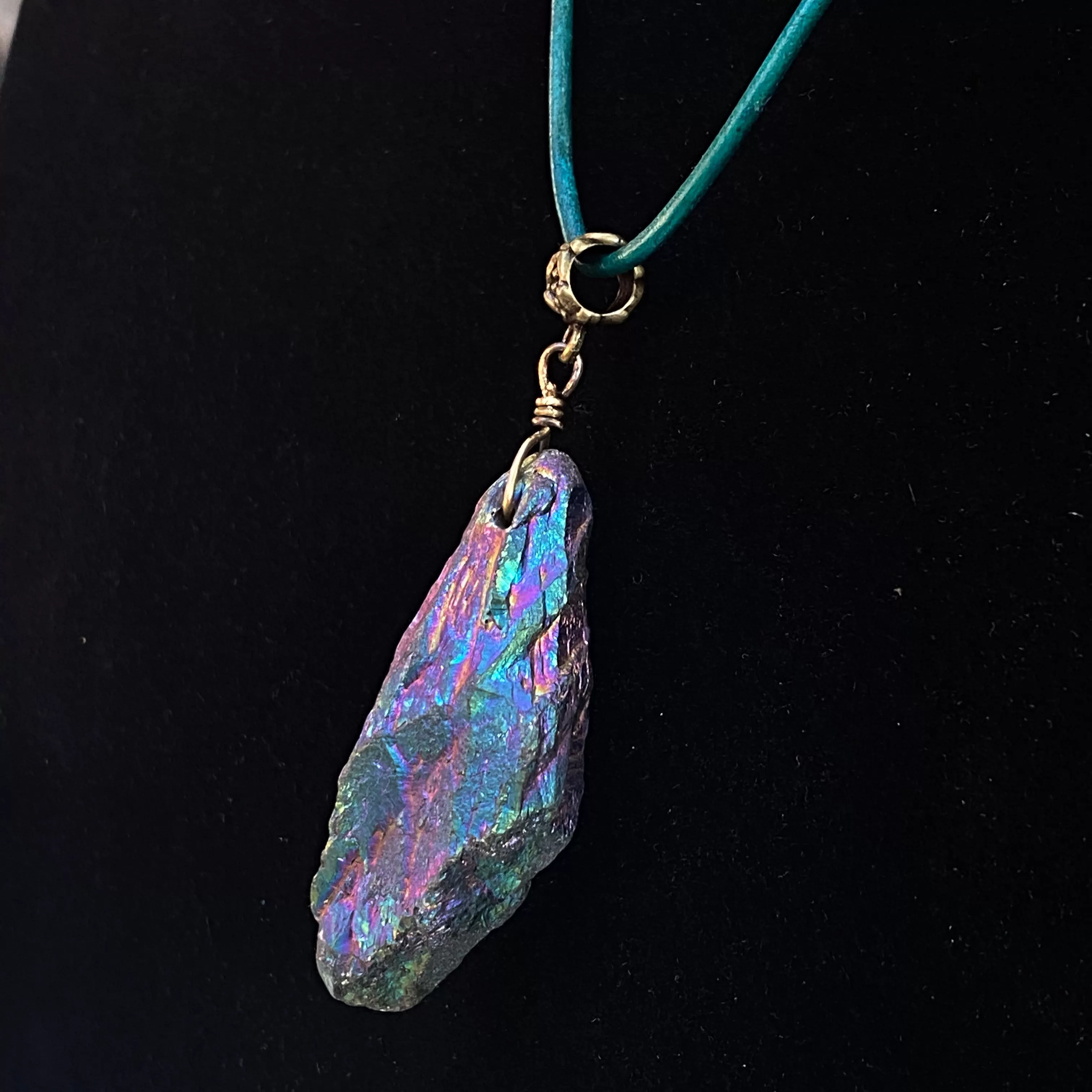 Titanium Coated Quartz gemstone on genuine Leather Necklace