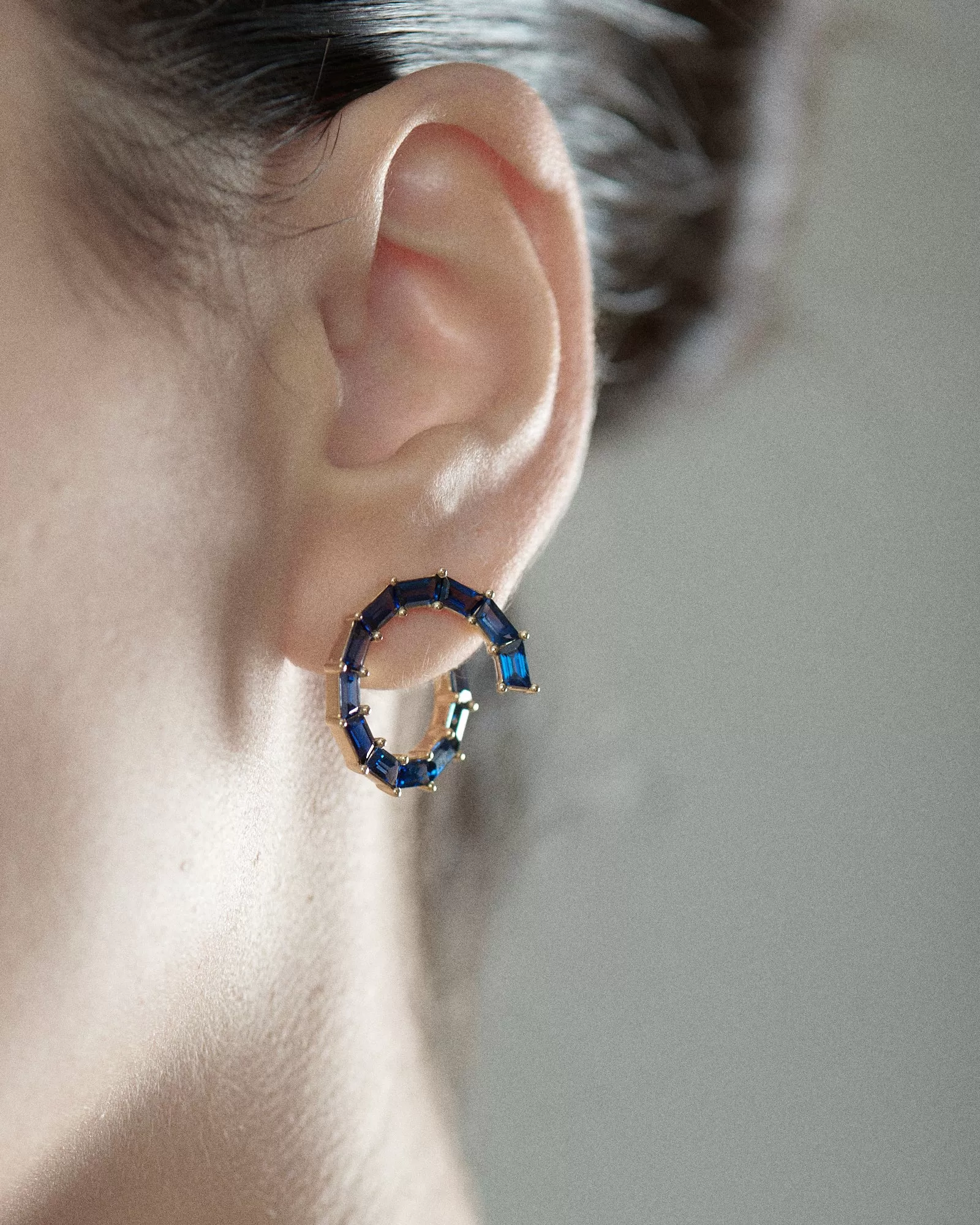 Whirlpool Sapphire Trapeze Spiral Hoop Earrings